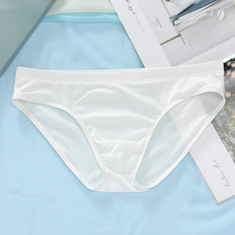 White breathable ribbed briefs for men, casual low-rise underwear, lightweight nylon and cotton blend, displayed stylishly.